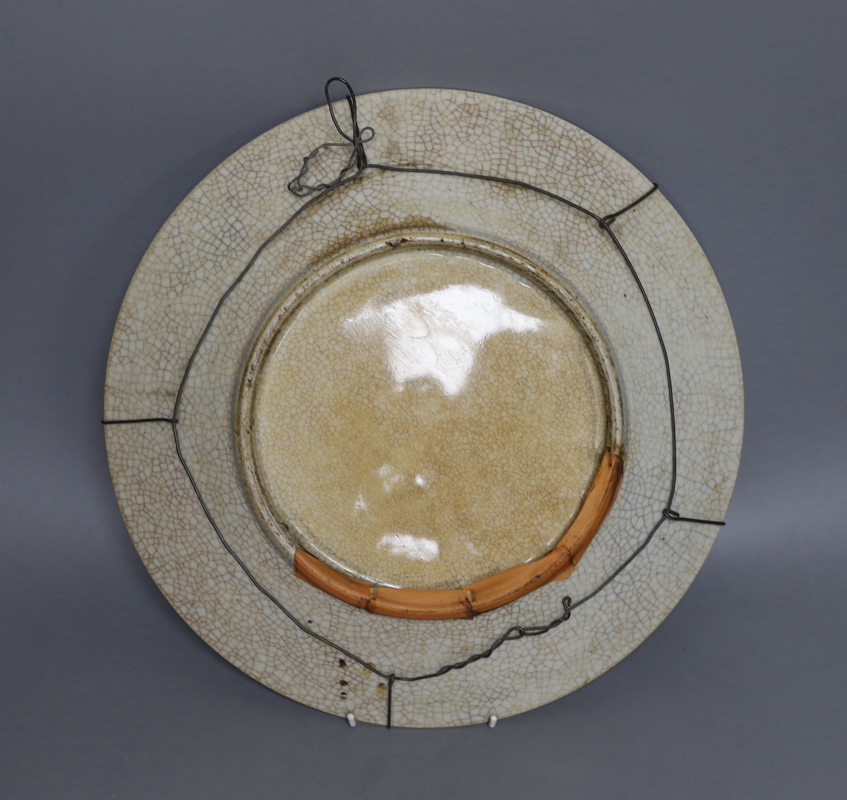 An early 20th century Chinese crackle glaze dish, 38cm